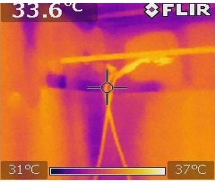 Thermal camera image of a shower ceiling and wall
